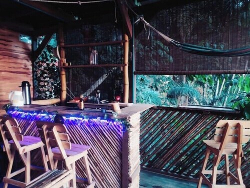 Lost Jungle Lodge Rooftop view room+bathroom
