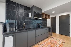 Fridge, microwave, stovetop, coffee/tea maker