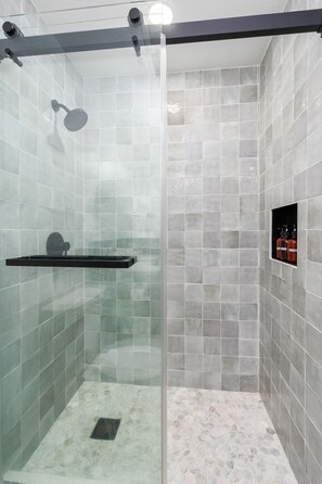 Shower, eco-friendly toiletries, hair dryer, towels