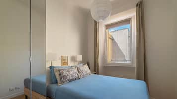 2 habitaciones, tabla de planchar con plancha, cuna de viaje y wifi