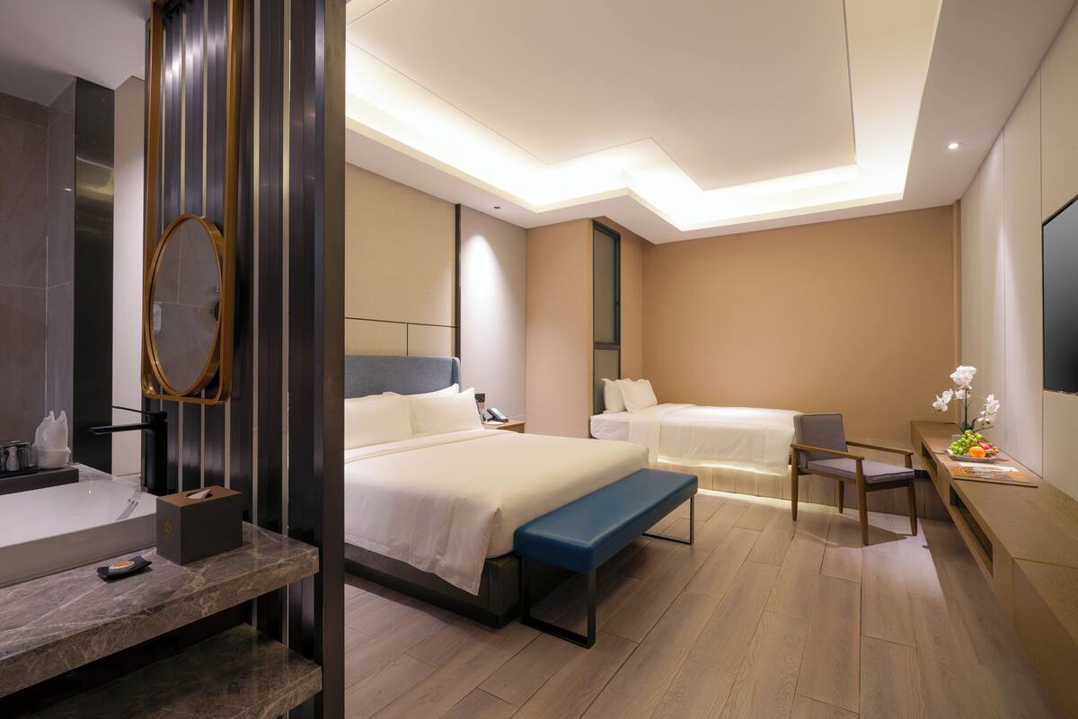 Roba de llit d'alta qualitat, minibar i caixa forta a l'habitació 