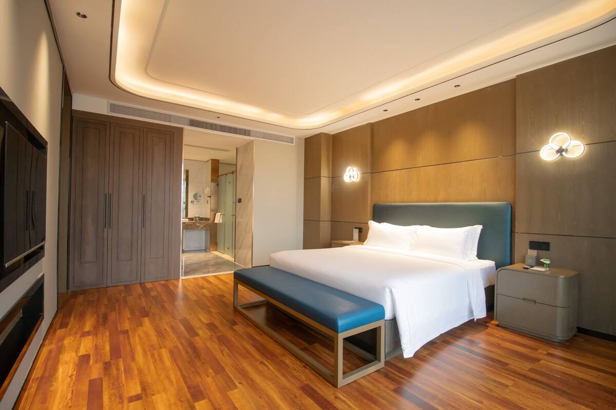 Roba de llit d'alta qualitat, minibar i caixa forta a l'habitació 