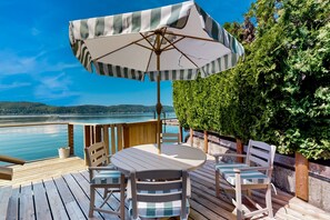 Outdoor dining - Waterfront getaway with expansive deck, gas grill & 40' private waterfront (Belfair)