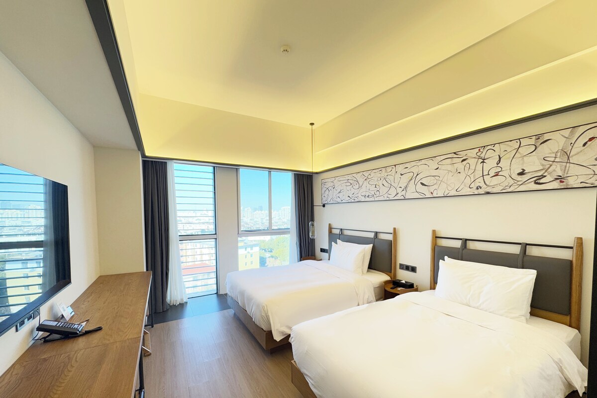 Family Triple Room | Down comforters, memory foam beds, in-room safe, desk