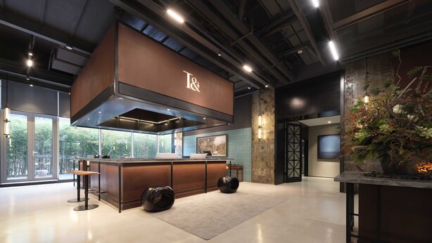 A modern kitchen with a T& coffee station, large windows, and a decorative plant. - Shanghai T Plus Hotel Residence (Shanghai)