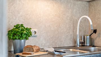 Fridge, stovetop, coffee/tea maker, electric kettle
