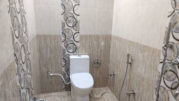 Shower, rainfall showerhead, towels, soap