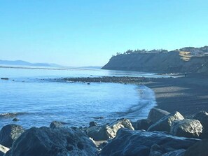 On the beach, sun loungers, beach towels
