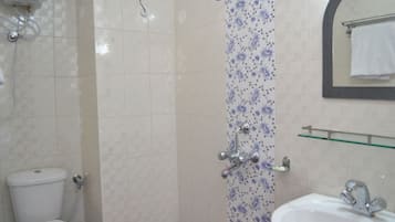 Shower, rainfall showerhead, towels, soap