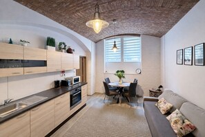 Family Apartment, 2 Bedrooms, Kitchen, Courtyard Area | Private kitchen | Full-size fridge, microwave, oven, stovetop - Residence Dobrovskeho 30 (Prague)