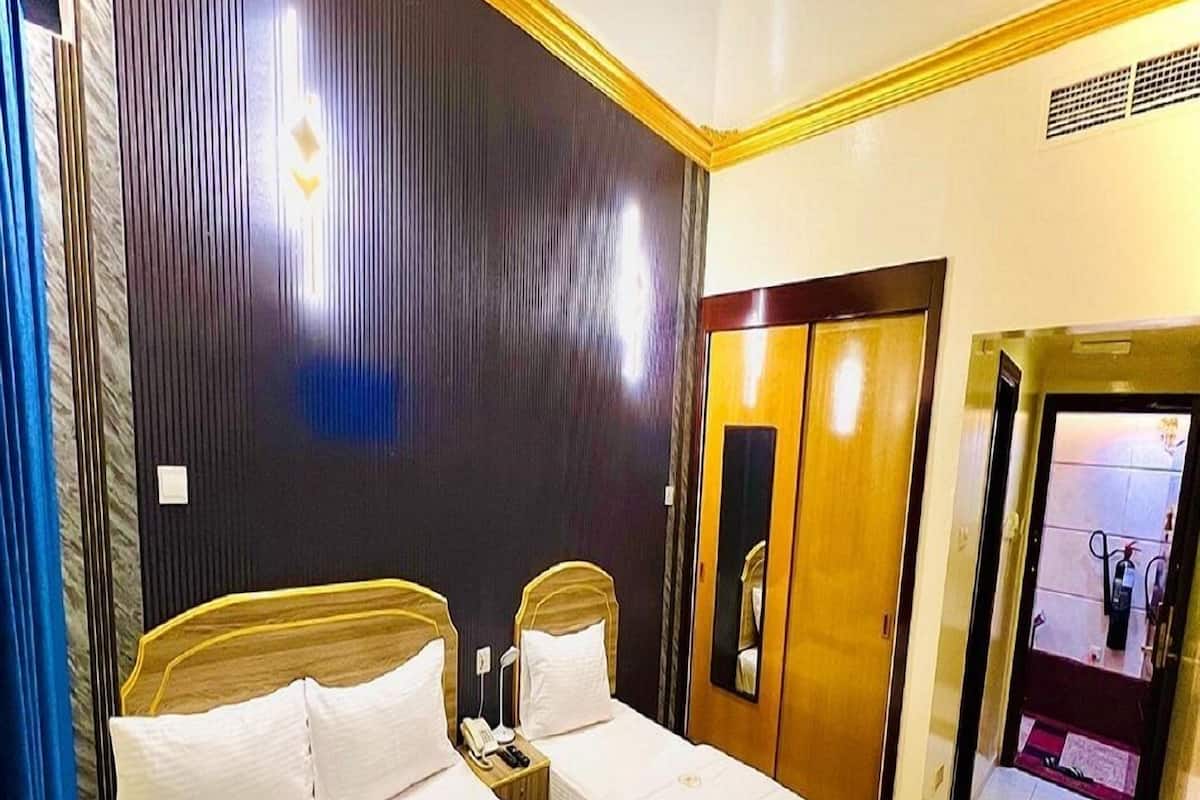 Quartos à prova de som, ferros/tábuas de passar roupa, Wi-Fi de cortesia