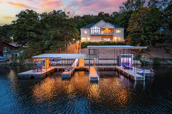Welcome to your HUGE private dock! Fully equip with a slide, lily pad, kayaks, paddle boat, fishing poles and lounge chairs. Rent a boat with a wave runners and tie them up to this dock during your stay! The largest slip is a 16x36