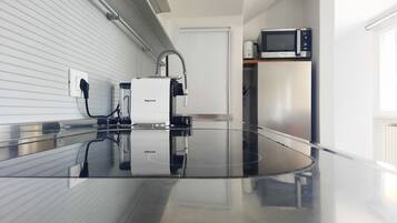 Fridge, microwave, stovetop, coffee/tea maker