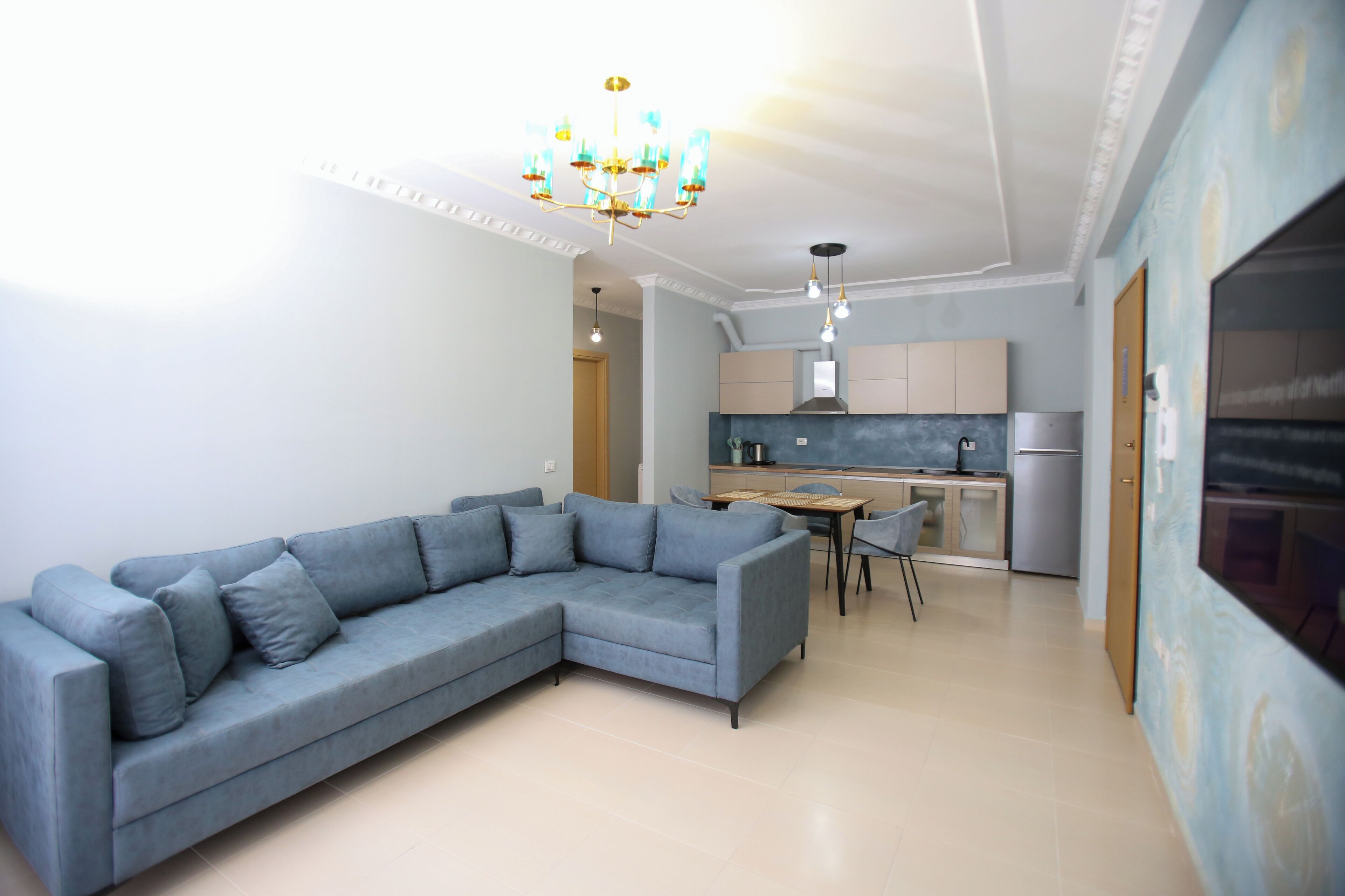 Apartamento superluxo | Área de estar | TV