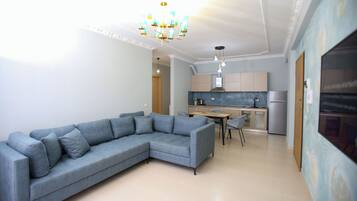 Luxury Apartment | Living area | TV