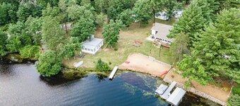 CHARMING COTTAGE ON ROCHE-A-CRI LAKE WITH PRIVATE PIER AND BEACH - PET FRIENDLY