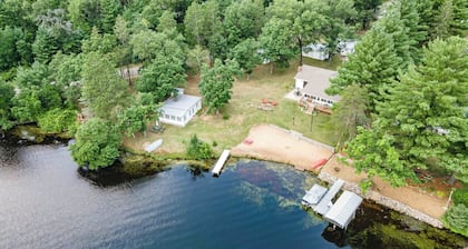 CHARMING COTTAGE ON ROCHE-A-CRI LAKE WITH PRIVATE PIER AND BEACH - PET FRIENDLY