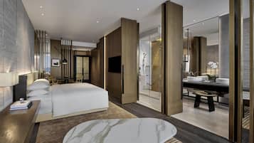 Premium bedding, free minibar items, in-room safe, desk