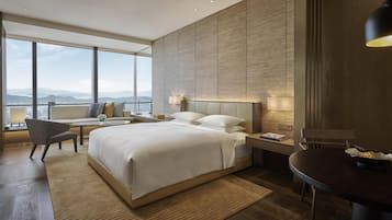 Premium bedding, free minibar items, in-room safe, desk