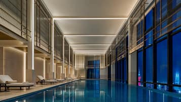 Indoor pool, open 6:00 AM to 9:00 PM, pool loungers