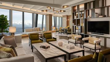 Premium bedding, free minibar items, in-room safe, desk