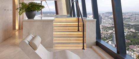 Indoor pool, open 6:00 AM to 9:00 PM, pool loungers