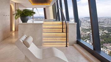 Indoor pool, open 6:00 AM to 9:00 PM, pool loungers