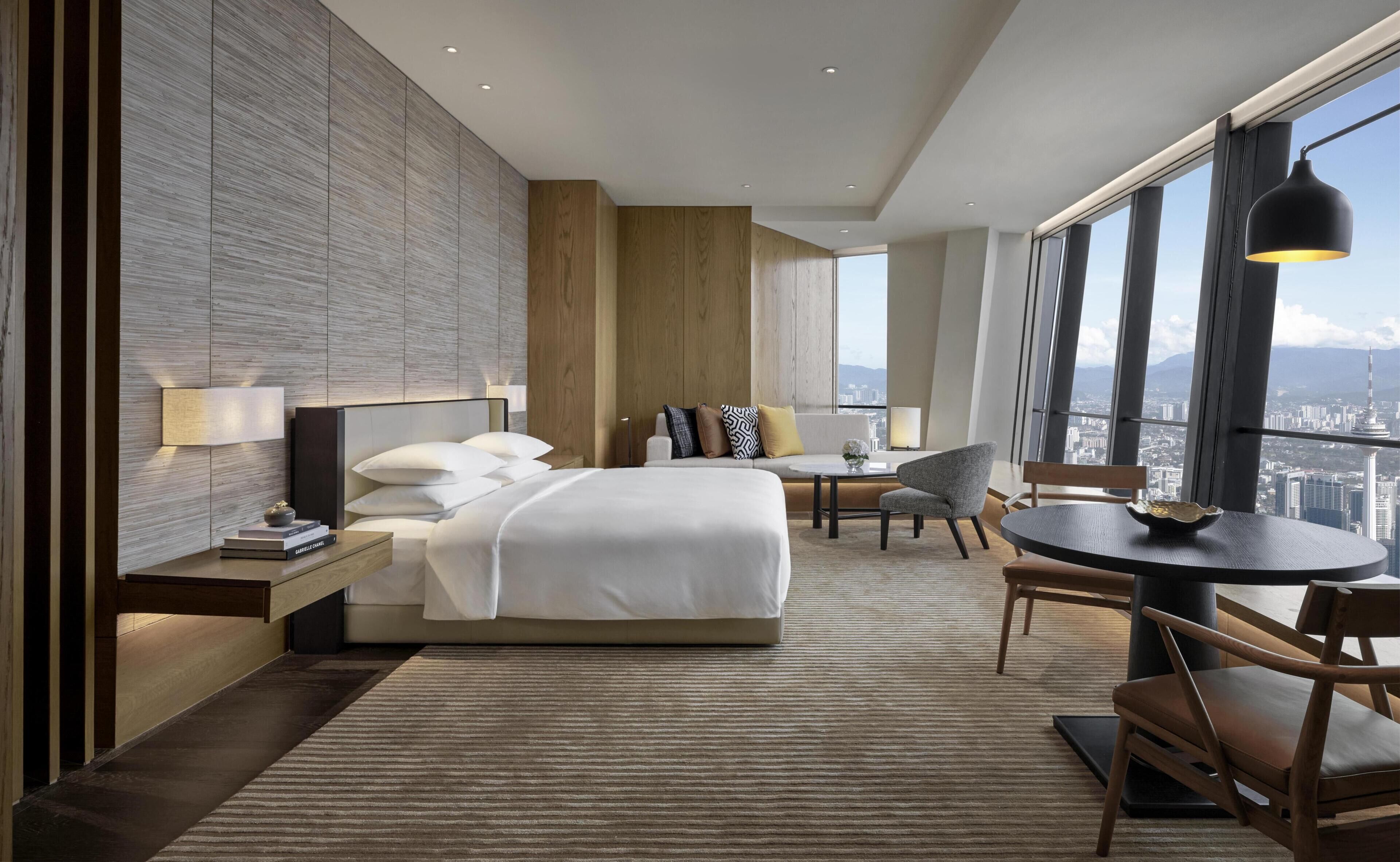 Premium bedding, free minibar items, in-room safe, desk