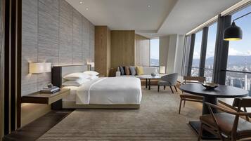 Premium bedding, free minibar items, in-room safe, desk