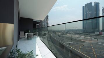Deluxe Apartment, Balcony, City View | Terrace/patio