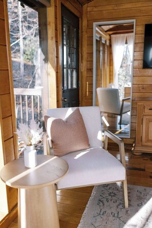 Terrace/patio - Immerse yourself into nature's beauty while enjoying the comforts of this charming cabin (Stanton)