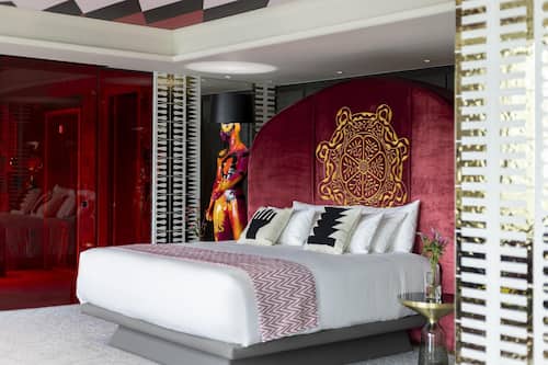 Minibar, desk, bed sheets