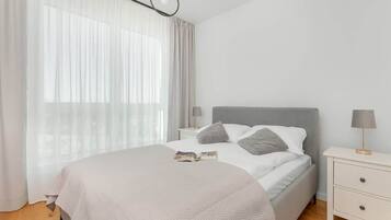 1 dormitorio, tabla de planchar con plancha, wifi y ropa de cama