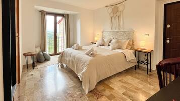 Double Room, Mountain View | Down comforters, individually decorated, individually furnished