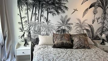 1 slaapkamer, een strijkplank/strijkijzer, wifi, beddengoed