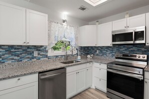 Fridge, microwave, oven, stovetop - Blue Harbour Haven: Pool Access | Pet-Friendly (Kill Devil Hills)
