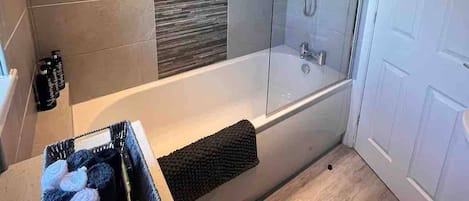 Hair dryer, towels, soap, shampoo