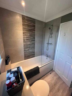 Hair dryer, towels, soap, shampoo