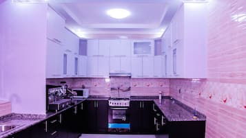 Full-size fridge, microwave, espresso maker, coffee/tea maker