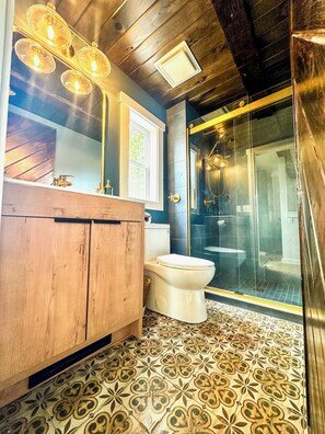 Shower, hair dryer, towels, soap
