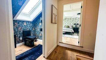 2 bedrooms, desk, iron/ironing board, travel crib