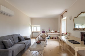 Apartamento, vista para o jardim | Área de estar