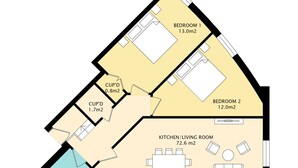 A floor plan of a house with two bedrooms, a kitchen/living room, a bathroom, and two cupids. - Buzzing Brighton Apartment 4 | By My Getaways (Brighton)
