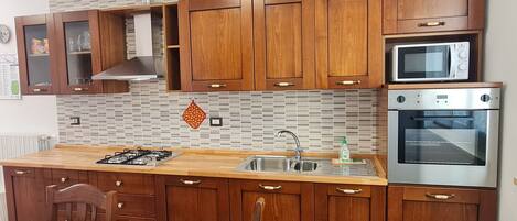 Fridge, microwave, oven, coffee/tea maker