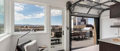 65-inch flat-screen TV with digital channels, TV