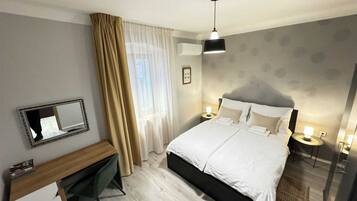 1 chambre, fer et planche à repasser, Wi-Fi gratuit, draps fournis