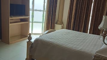 Suite superior, vista a la ciudad | 1 habitación
