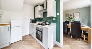 Superior House, 2 Bedrooms | Living area | TV
