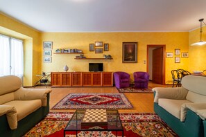 Apartment, Balcony, Lake View | Living area | 35-inch TV with digital channels - Rubini Apartment by Wonderful Italy (Dongo)