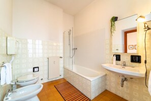 Apartment, Balcony, Lake View | Bathroom | Combined shower/tub, hair dryer, bidet, towels - Rubini Apartment by Wonderful Italy (Dongo)